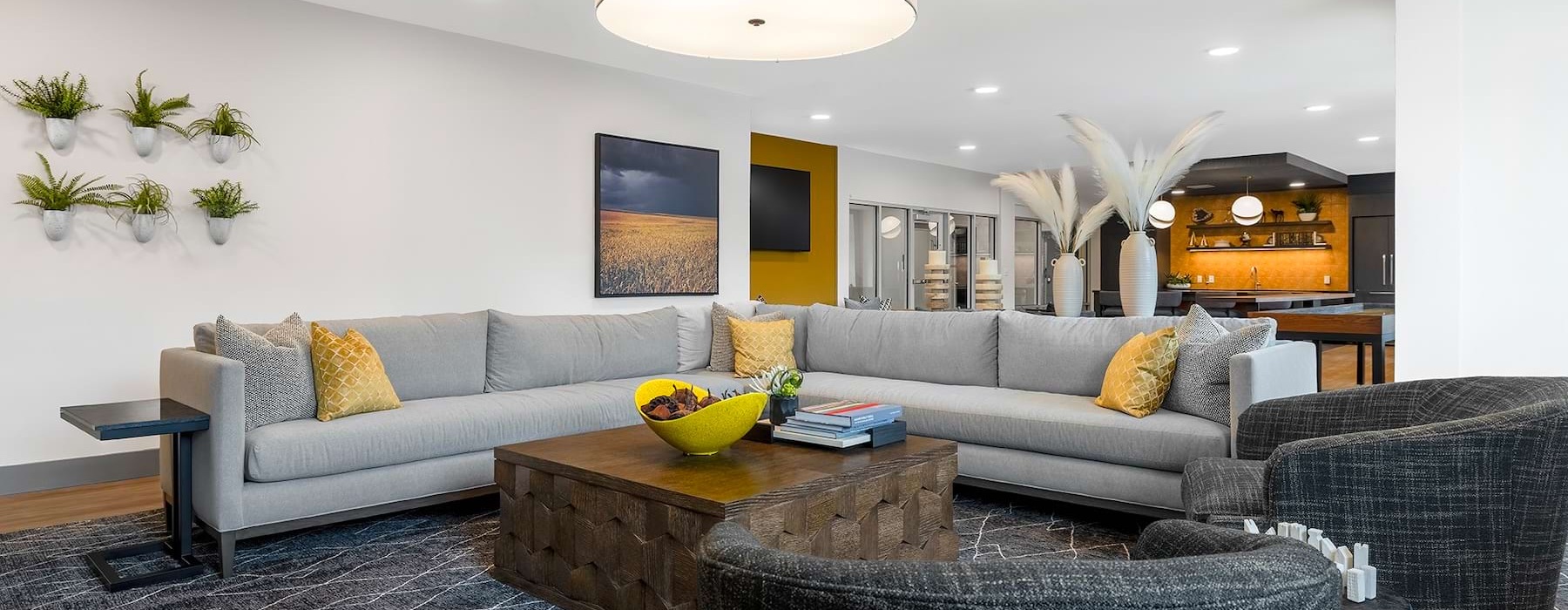 Resident lounge at Ironwood at Waldorf Station featuring modern seating, fireplace, and social spaces in Waldorf, Maryland