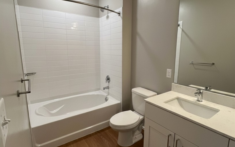 E2 - 3 bedroom floor plan layout with 2 bathrooms and 1375 square feet (Primary Bathroom)